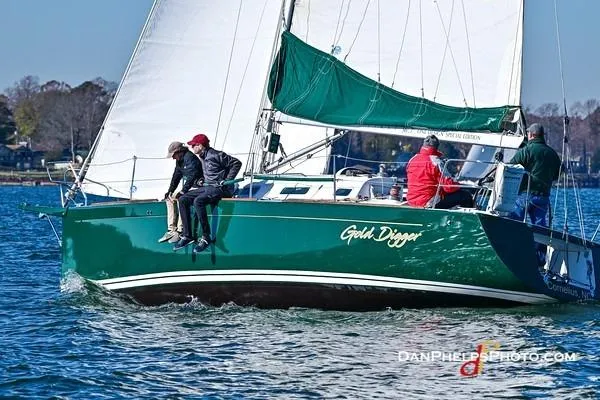 Slide: The Image of Sailing on a 2005 Beneteau First 36.7 yacht named "Gold Digger" with green sails. - 9