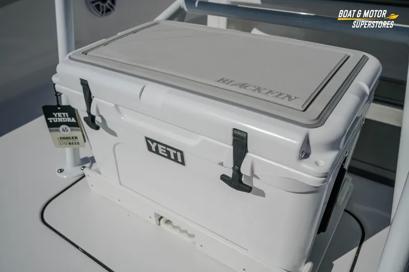 Slide: The Image of YETI Tundra cooler on 2026 Blackfin 242 HB boat deck. - 11