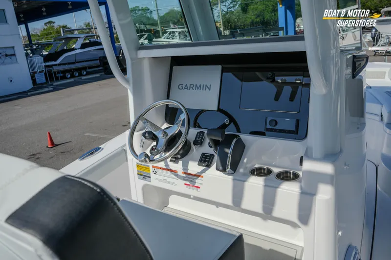 Slide: The Image of 2026 Blackfin 242 HB boat dashboard with Garmin navigation system. - 12
