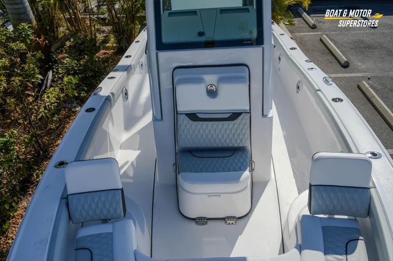 Slide: The Image of 2026 Blackfin 242 HB boat interior with white seating and modern design. - 18