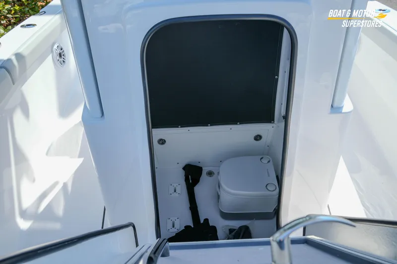 Slide: The Image of 2026 Blackfin 242 HB boat interior with compact marine toilet. - 20