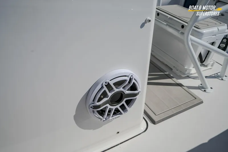 Slide: The Image of Speaker on 2026 Blackfin 242 HB boat deck, showcasing modern marine audio system. - 22