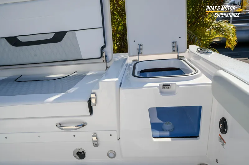 Slide: The Image of 2026 Blackfin 242 HB boat interior with open storage compartments. - 25