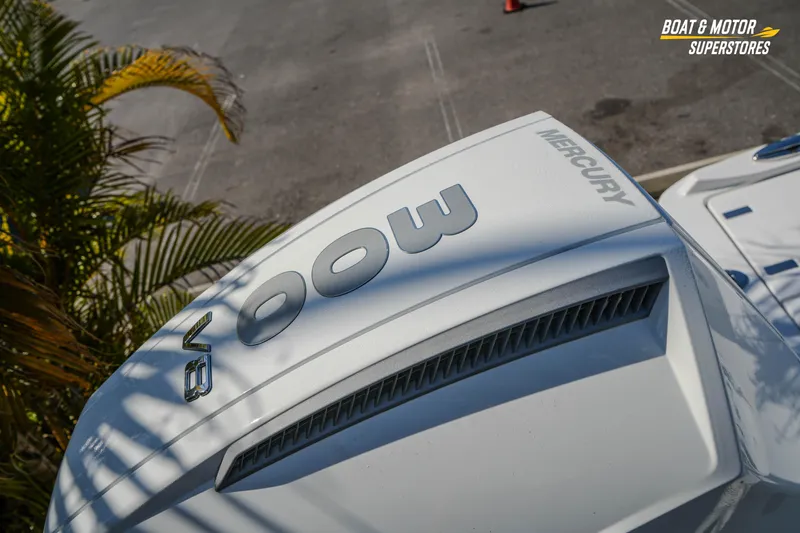 Slide: The Image of 2026 Blackfin 242 HB with Mercury 300 V8 engine, outdoor display. - 8