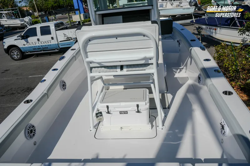 Slide: The Image of 2026 Blackfin 242 HB boat interior with seating and Yeti cooler. - 9