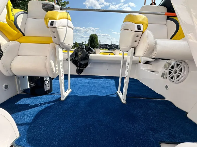 Slide: The Image of Interior of a 2001 Donzi Daytona 38 ZX boat with blue carpeting. - 4