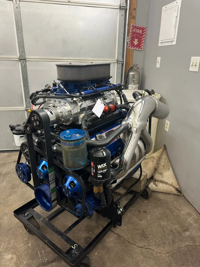 Slide: The Image of Engine of a 2001 Donzi Daytona 38 ZX in a workshop. - 8