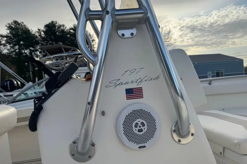 Slide: The Image of 2013 Pioneer 197 Sportfish boat console with American flag and speaker. - 3