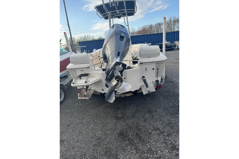 Slide: The Image of Rear view of a 2013 Pioneer 197 Sportfish boat with outboard motor. - 7
