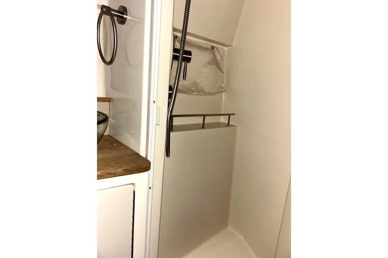 Slide: The Image of Shower area in 2019 Sea Ray Sundancer 350 Coupe yacht bathroom. - 13