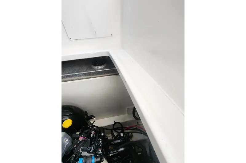 Slide: The Image of Engine compartment of a 2019 Sea Ray Sundancer 350 Coupe boat. - 34