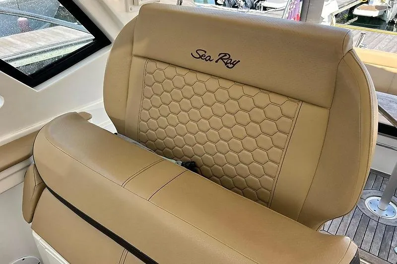 Slide: The Image of Luxurious tan seating on 2019 Sea Ray Sundancer 350 Coupe yacht interior. - 7