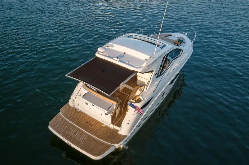Slide: The Image of Manufacturer Provided Image: 2019 Sea Ray Sundancer 350 Coupe yacht on calm water. - 9