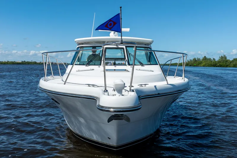 Slide: The Image of 2005 Tiara Yachts 3200 Open cruising on a sunny day, front view. - 24