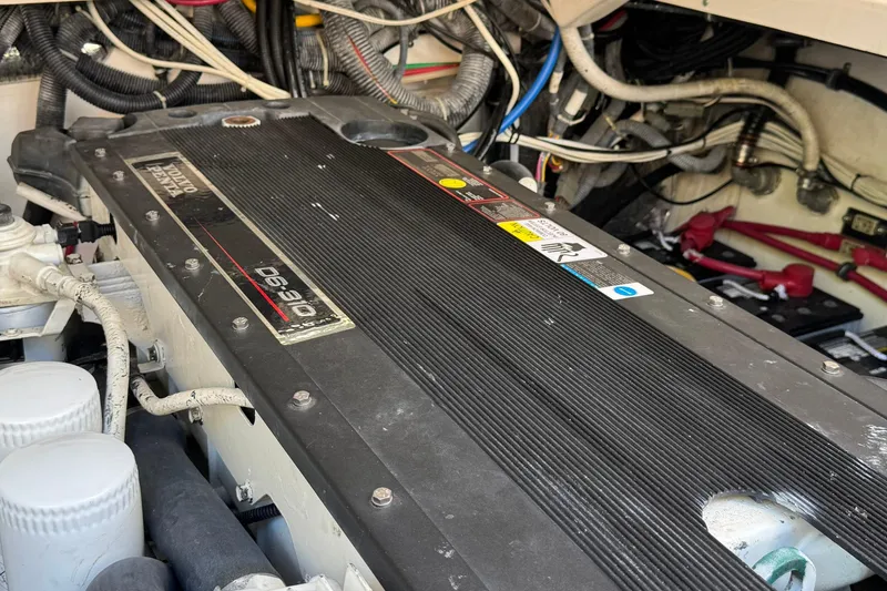 Slide: The Image of Engine compartment of a 2005 Tiara Yachts 3200 Open, featuring a Volvo Penta D6-310 engine. - 65