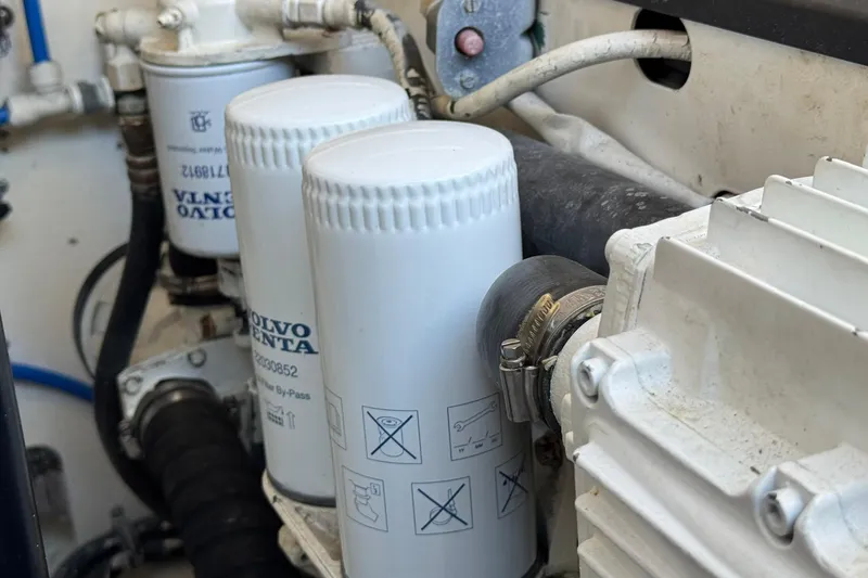 Slide: The Image of Engine compartment of a 2005 Tiara Yachts 3200 Open with Volvo Penta filters. - 68