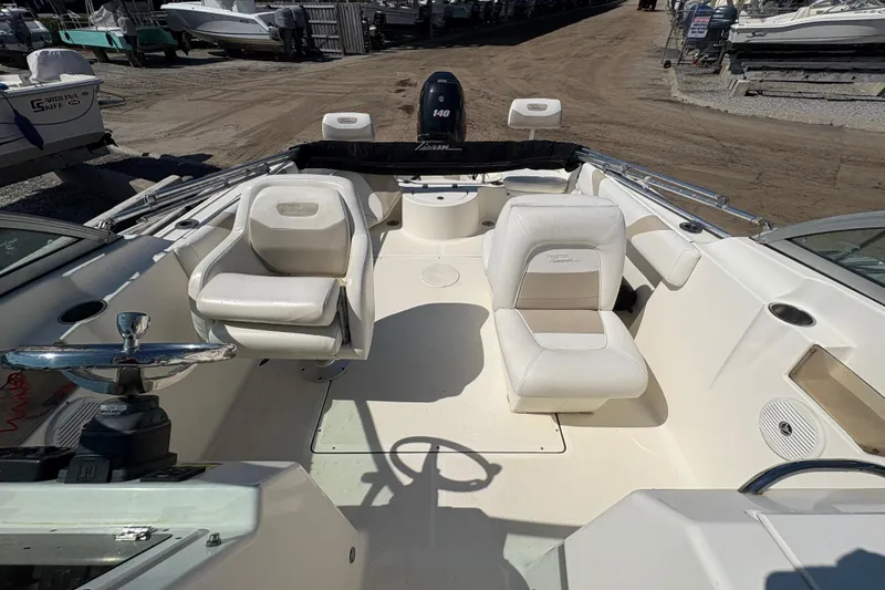 Slide: The Image of 2012 Pioneer 197 Venture boat interior with seating and steering wheel. - 14