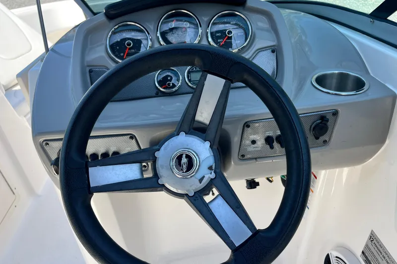 Slide: The Image of Steering wheel and dashboard of 2016 Chaparral 21 H2O Sport boat. - 9