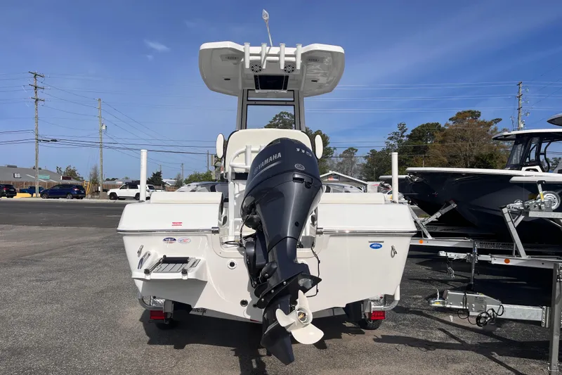 Slide: The Image of 2026 Tidewater 198 CC Adventure boat with Yamaha outboard motor, parked on a trailer. - 3