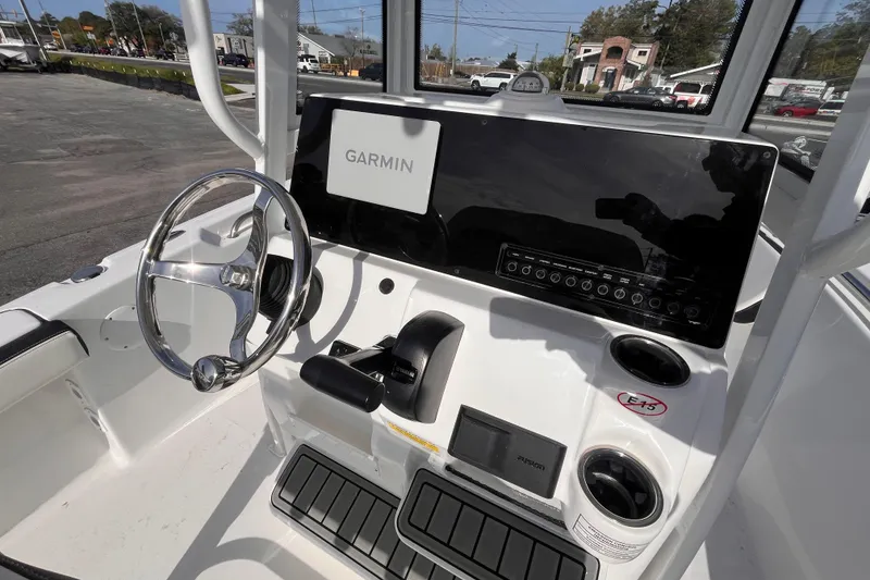 Slide: The Image of 2026 Tidewater 198 CC Adventure boat dashboard with Garmin navigation system. - 8