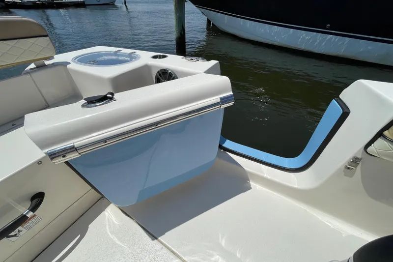 Slide: The Image of 2023 Sea Chaser 24 HFC boat interior, featuring sleek design and water view. - 34