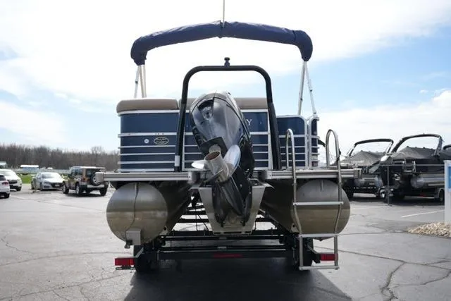 Slide: The Image of 2012 South Bay 722CR pontoon boat with outboard motor on trailer. - 6