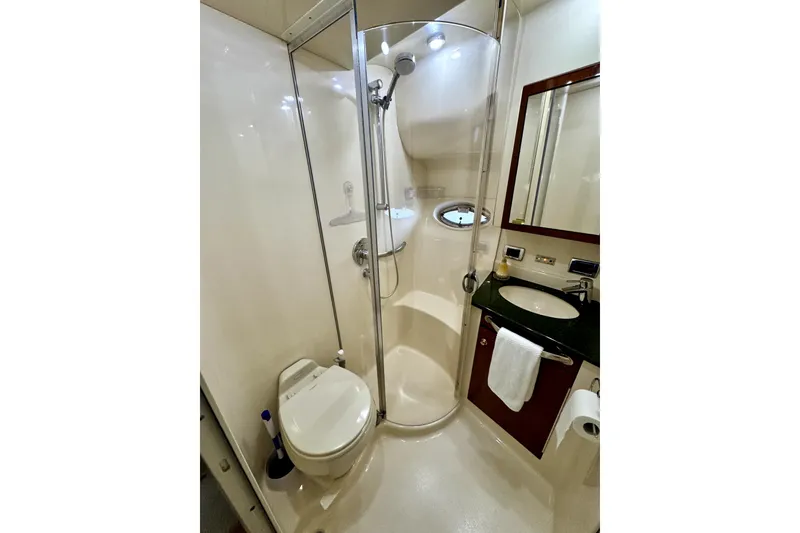 Slide: The Image of Bathroom interior of 2003 Sea Ray 390 Motor Yacht with shower and sink. - 11