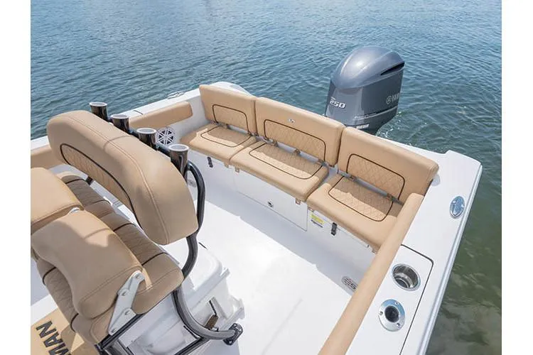 Slide: The Image of 2021 Sportsman Heritage 231 Center Console with beige seating area. - 10