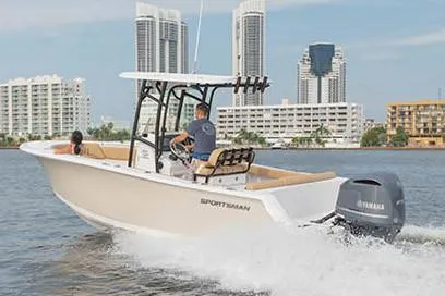 Slide: The Image of 2021 Sportsman Heritage 231 Center Console on water with skyscrapers in background. - 3