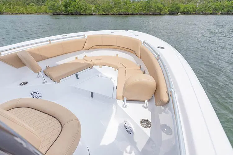Slide: The Image of 2021 Sportsman Heritage 231 Center Console with beige seating area. - 5