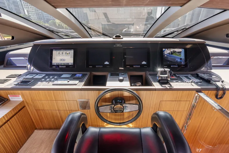 Slide: The Image of Cockpit of 2020 Riva 100' Corsaro yacht with advanced navigation systems. - 30