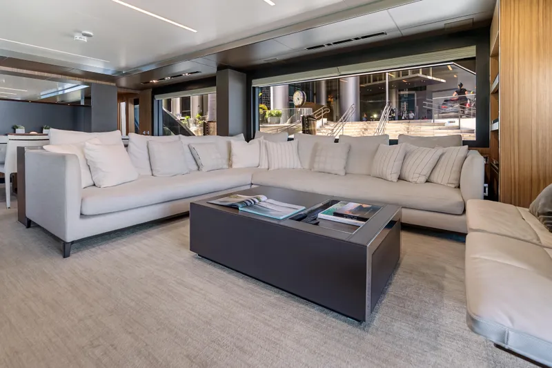 Slide: The Image of Luxurious interior of 2020 Riva 100' Corsaro yacht with elegant seating and modern decor. - 35