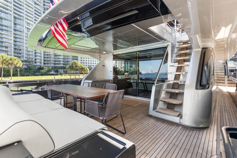 Slide: The Image of Luxurious 2020 Riva 100' Corsaro yacht deck with elegant seating and modern design. - 43