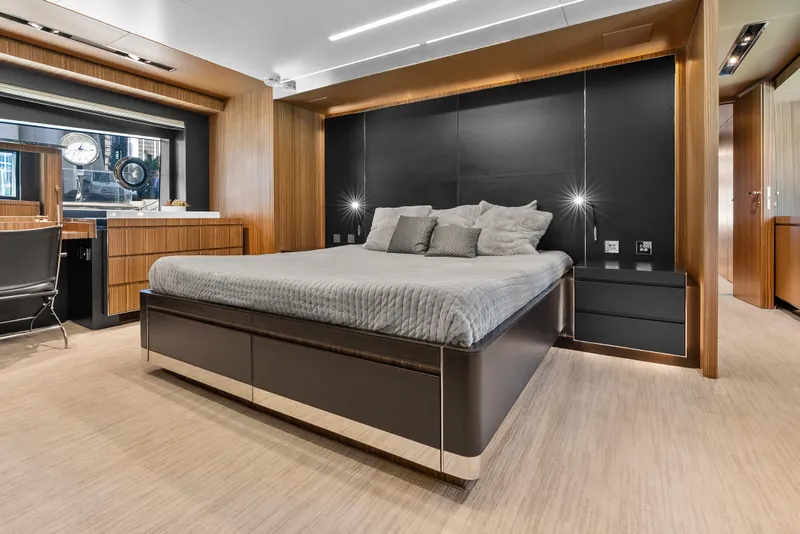 Slide: The Image of Luxurious bedroom interior on 2020 Riva 100' Corsaro yacht with modern design elements. - 52