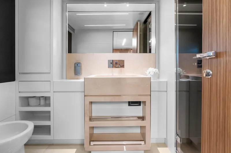 Slide: The Image of Luxurious bathroom interior on 2020 Riva 100' Corsaro yacht, featuring modern sink and elegant design. - 66