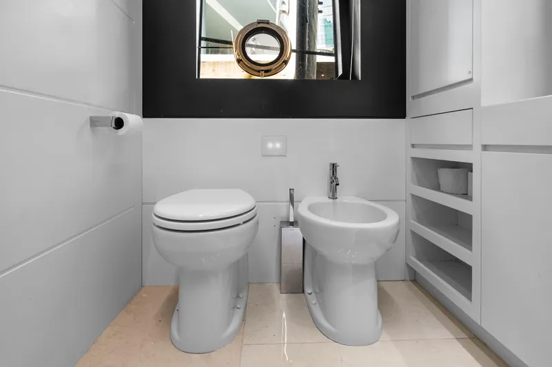 Slide: The Image of Modern bathroom on 2020 Riva 100' Corsaro yacht with toilet and bidet. - 73