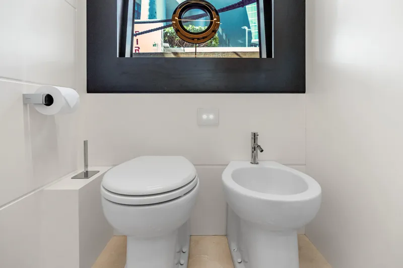 Slide: The Image of Modern bathroom on 2020 Riva 100' Corsaro yacht with toilet and bidet. - 74