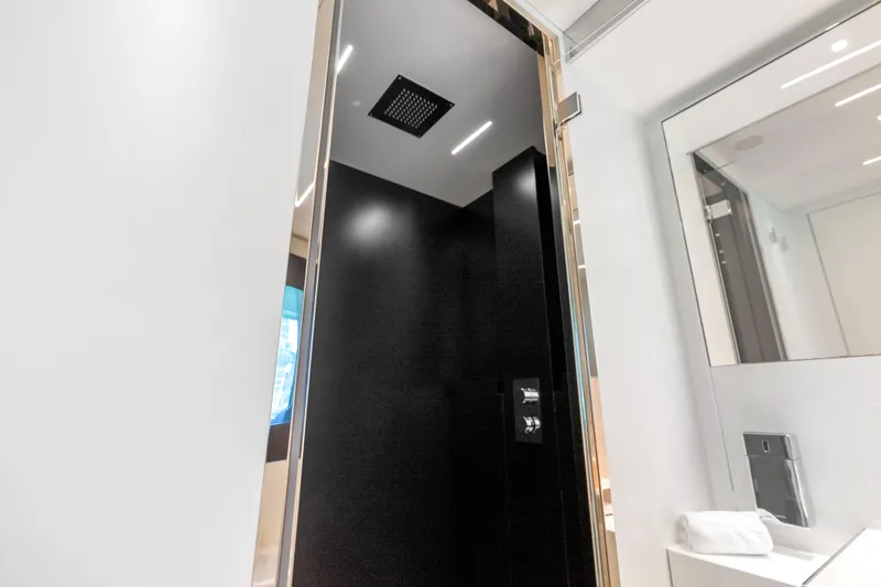 Slide: The Image of Luxurious bathroom interior on 2020 Riva 100' Corsaro yacht, featuring sleek modern design. - 76