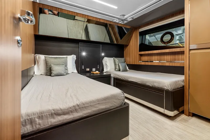 Slide: The Image of Luxurious cabin interior of 2020 Riva 100' Corsaro yacht with twin beds. - 82