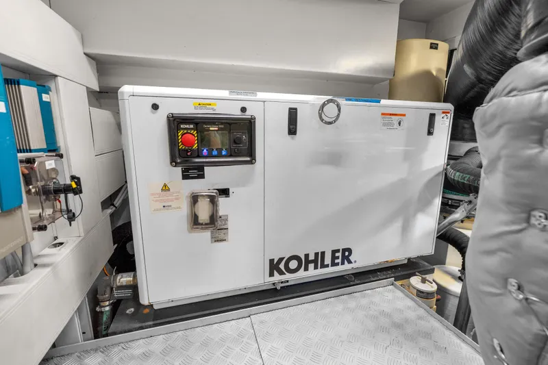 Slide: The Image of Engine room of 2020 Riva 100' Corsaro yacht featuring Kohler generator. - 83