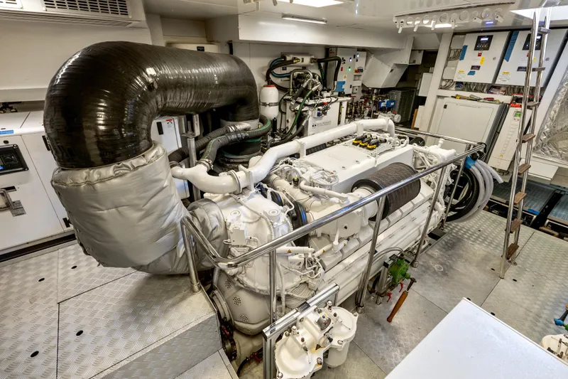 Slide: The Image of Engine room of 2020 Riva 100' Corsaro yacht, showcasing advanced machinery and equipment. - 84