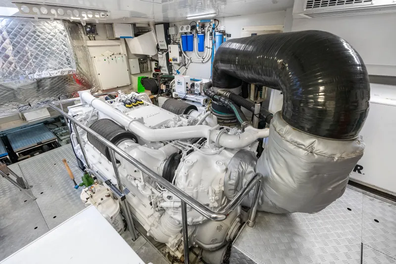 Slide: The Image of Engine room of 2020 Riva 100' Corsaro yacht, showcasing advanced machinery and components. - 86