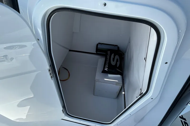 Slide: The Image of Storage compartment of 2026 Sportsman Masters 247OE Bay Boat, featuring spacious interior. - 17