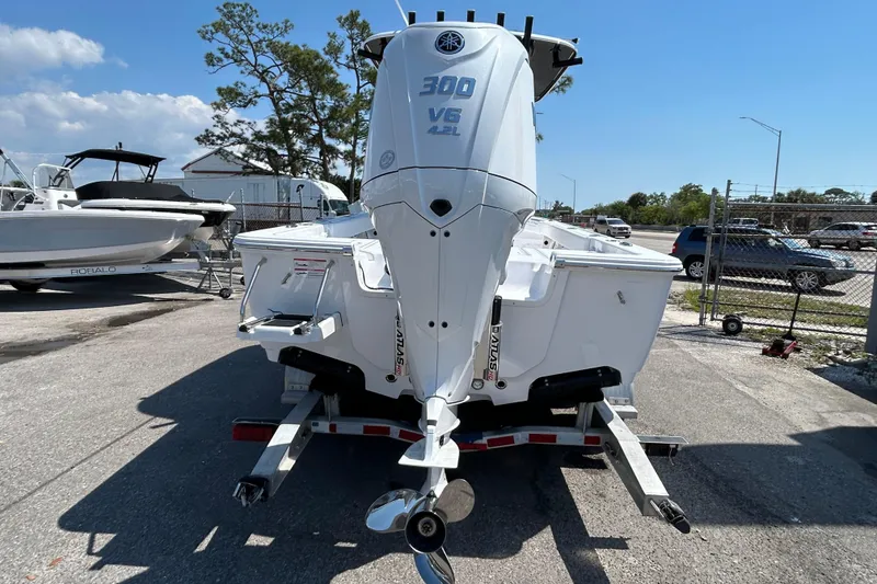 Slide: The Image of 2026 Sportsman Masters 247OE Bay Boat with Yamaha 300 V6 engine on trailer. - 8