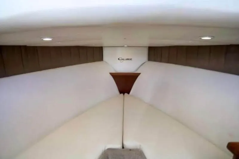 Slide: The Image of Interior of 2006 Calyber 29 Express boat with microwave and compact fridge. - 6