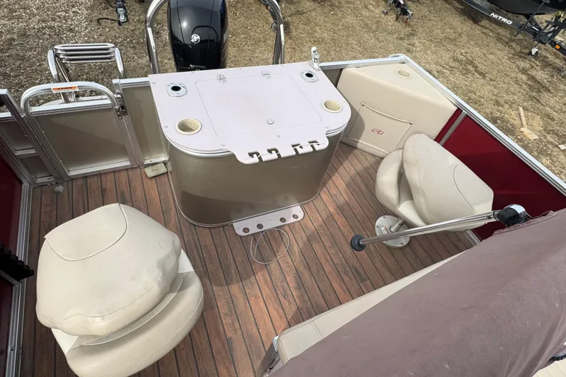 Slide: The Image of 2014 Avalon Windjammer Fish 24' boat interior with seating and fishing station. - 12