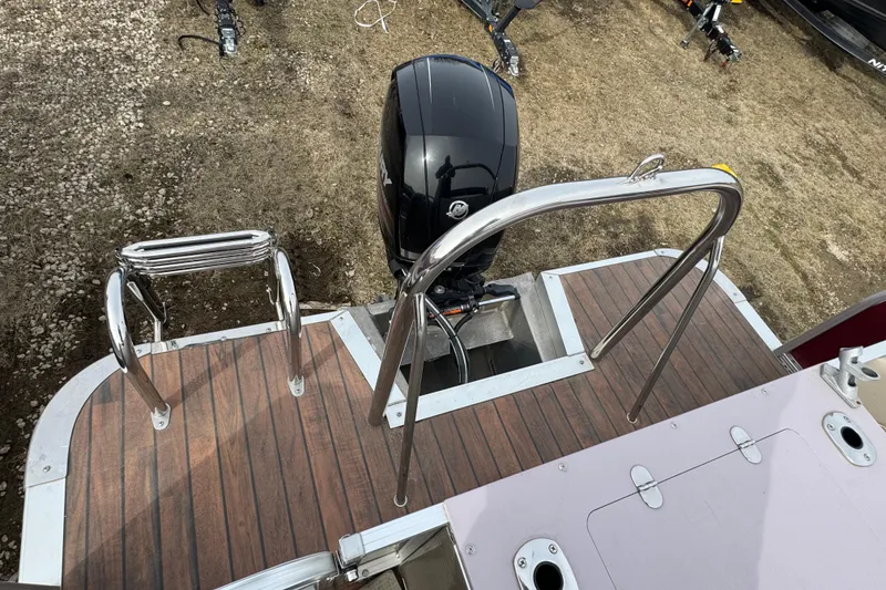 Slide: The Image of 2014 Avalon Windjammer Fish boat stern with motor and swim ladder. - 13