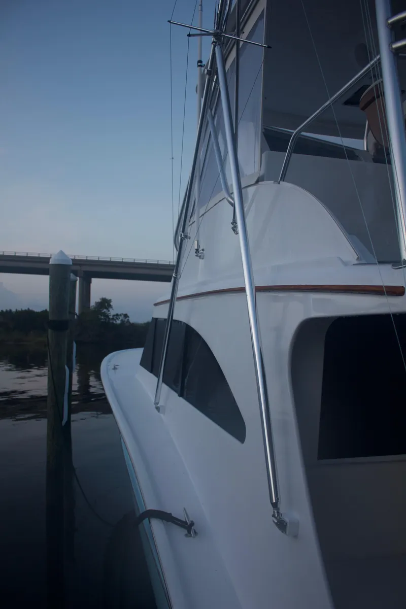 Slide: The Image of 2004 Hudson Custom Carolina yacht docked at sunset. - 10