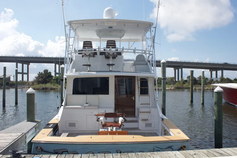 Slide: The Image of Rear view of a 2004 Hudson Custom Carolina yacht at the dock. - 13