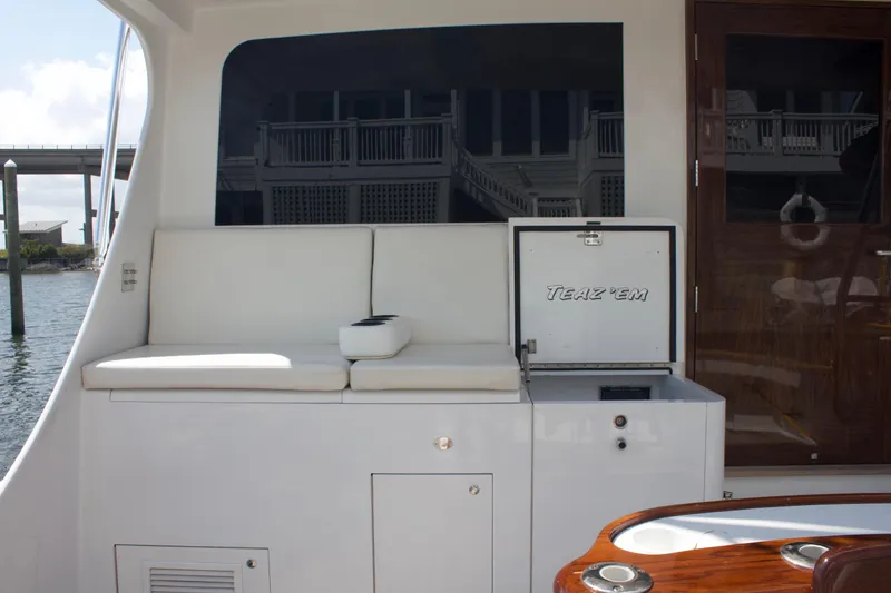 Slide: The Image of 2004 Hudson Custom Carolina yacht interior with seating and refrigerator. - 16